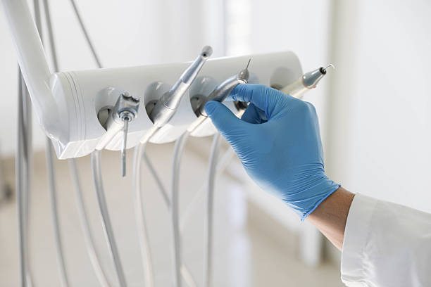 Professional Teeth Whitening technician working in Phoenix, IL